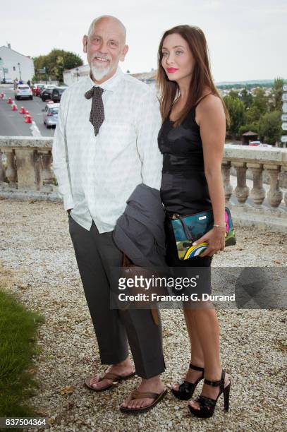 President of the Jury, actor John Malkovich and Princess Isabella Orsini attend the Jury photocall during the 10th Angouleme French-Speaking Film...
