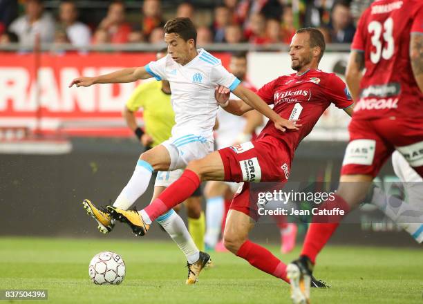 Maxime Lopez of OM and David Rozehnal of KV Oostende during the UEFA Europa League third qualifying round second leg match between KV Oostende and...