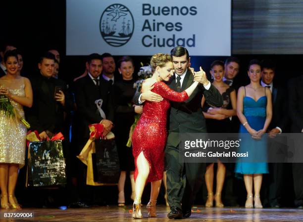 German Ballejo and Magdalena Gutierrez of Argentina dance during the final round of the Tango Salon competition as part of the Buenos Aires...