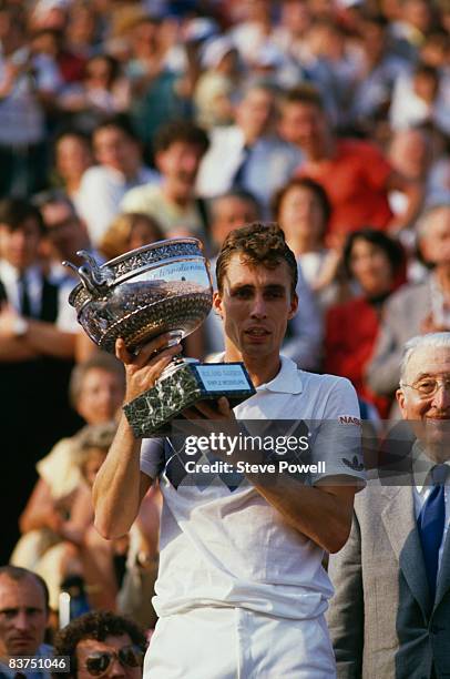 Czech tennis player Ivan Lendl with the trophy after winning the men's singles final of the Tournoi de Roland-Garros , at the Stade Roland Garros,...