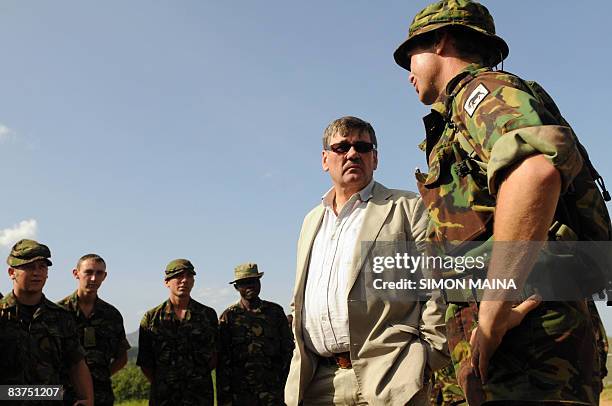 British Armed Forces Minister Bob Ainsworth speaks to British army personnel at a military training base in Nanyuki, 240 kms north-east of Nairobi...