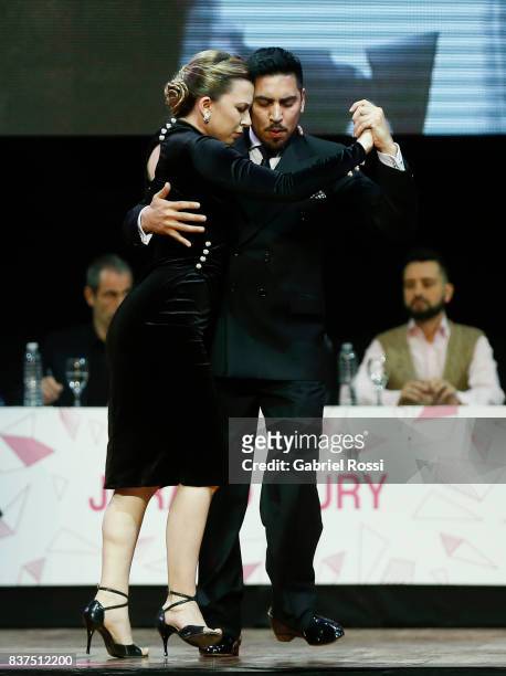 Jose Luis Salvo and Carla Rossi of Argentina dance during the final round of the Tango Salon competition as part of the Buenos Aires International...