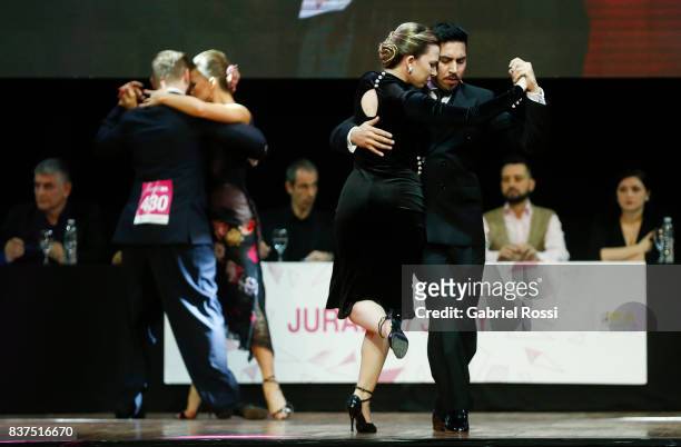 Jose Luis Salvo and Carla Rossi of Argentina dance during the final round of the Tango Salon competition as part of the Buenos Aires International...