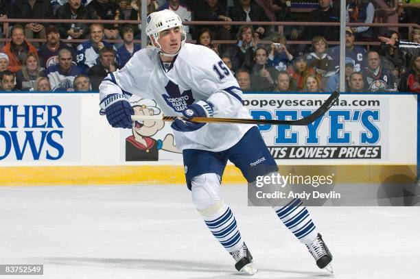 Tomas Kaberle of the Toronto Maple Leafs follows the puck during a game against the Edmonton Oilers at Rexall Place in Edmonton, Alberta on November...