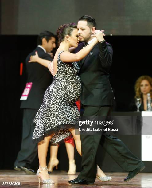 Luis Romero and Ana Migoni of Argentina dance during the final round of the Tango Salon competition as part of the Buenos Aires International Tango...