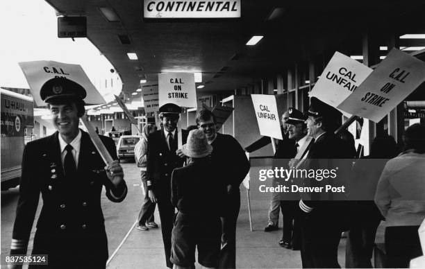 Out side the Continental Airline entry of the airport pilots, Attendant, began to picketing early Sat. Morning. About 8:00 they were jointed by...