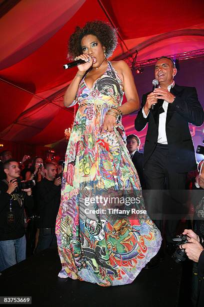 Singer Macy Gray sings with Designer Christian Audigier for his 50th Birthday Bash at the Peterson Automotive Museum on May 23, 2008 in Los Angeles,...