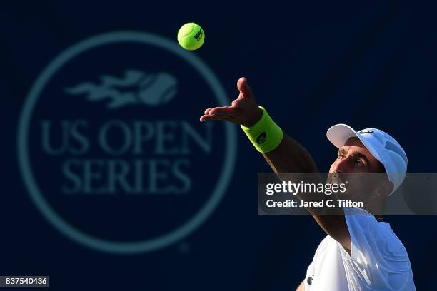 Steve Johnson serves to Yen-Hsun Lu of Chinese Taipei during the fourth day of the Winston-Salem Open at Wake Forest University on August 22, 2017 in...