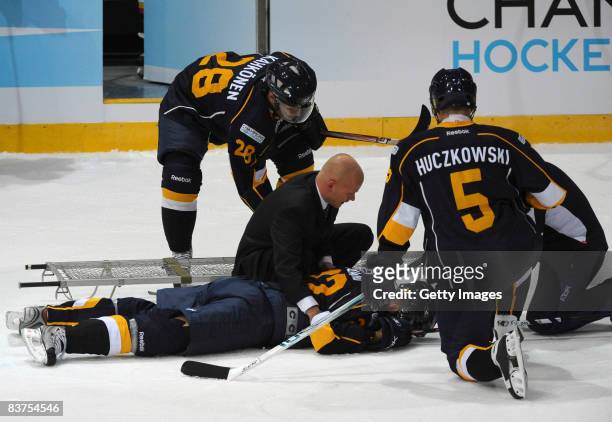 Rami Alanko of Espoo Blues lies on the ground during the IIHF Champions Hockey League match between Espoo Blues and SC Bern on November 19, 2008 in...