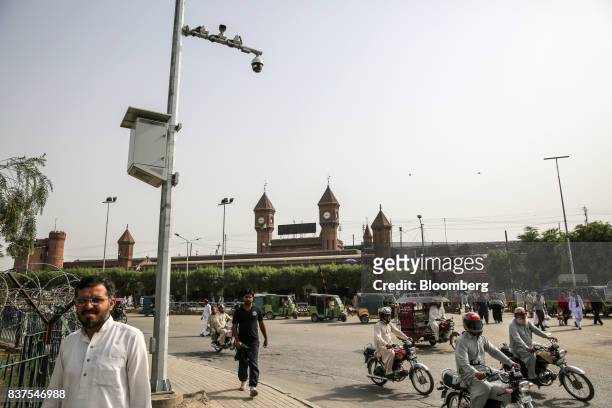 Security cameras operate as traffic drives along a road in Lahore, Pakistan, on Tuesday, June 13, 2017. While militants the U.S. Identifies as...
