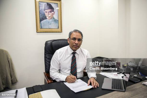 Akbar Nasir Khan, chief operating officer of Punjab Safe Cities Authority , sits for a photograph in Lahore, Pakistan, on Tuesday, June 13, 2017....