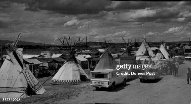 Indians in Camp Teepees share space with cars and campers at the American Indian Centennial Encampment at Skaggs Rodeo Arena in Colorado Springs...