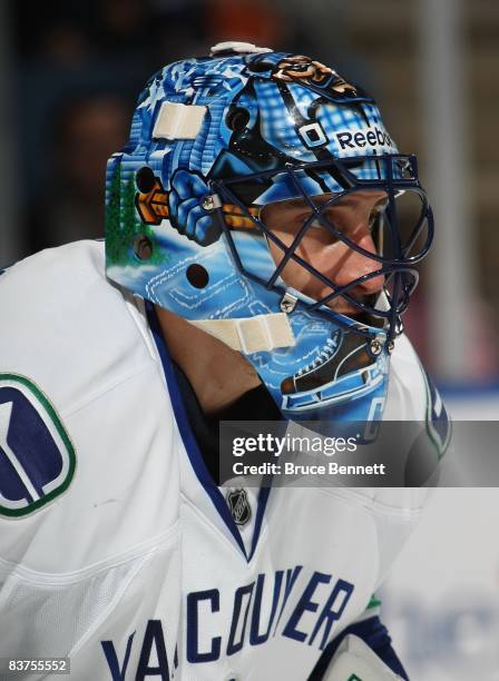 Goaltender Roberto Luongo of the Vancouver Canucks takes part in warmups prior to his game against the New York Islanders on November 17, 2008 at the...