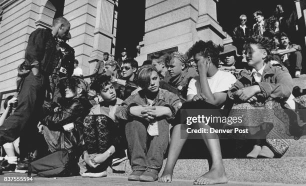 Members of Denver's youthful "punk" faction sit on the west steps of the state Capitol today in protest of what they believe to be unfair treatment...