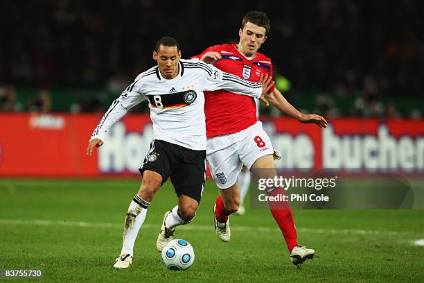 Jermaine Jones of Germany and Michael Carrick of England battle for the ball during the International Friendly match between Germany and England at...