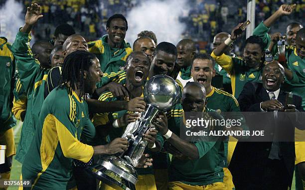 Bafana Bafana´s players celebrate their victory over Cameroon during the annual Nelson Mandela Challenge soccer game at Olympia Park in Rustenburg on...