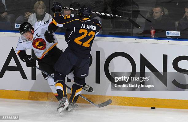 Rami Alanko of Espoo Blues fights for the puck during the IIHF Champions Hockey League match between Espoo Blues and SC Bern on November 19, 2008 in...