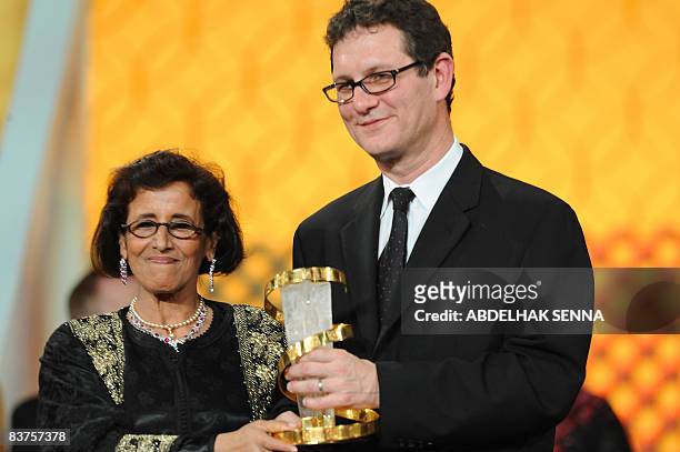 John Woodward from the UK Film Council receives from the Moroccan Minister of Culture, Touria Jabrane, an award in homage to the last 40 years of...