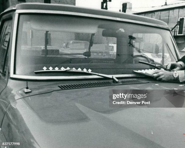 Plastic Tabs Help Clear Windshield Paper template at right is used to align the diamond-shaped plastic tabs which, their inventor says, keep the...