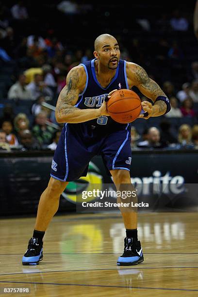 Carlos Boozer of the Utah Jazz looks to pass during the game against the Charlotte Bobcats on November 14, 2008 at Time Warner Cable Arena in...