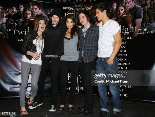 Actors Ashley Greene, Kellan Lutz, Nikki Reed, Jackson Rathbone and Taylor Lautner of the cast of "Twilight" attend an in-store autograph signing at...