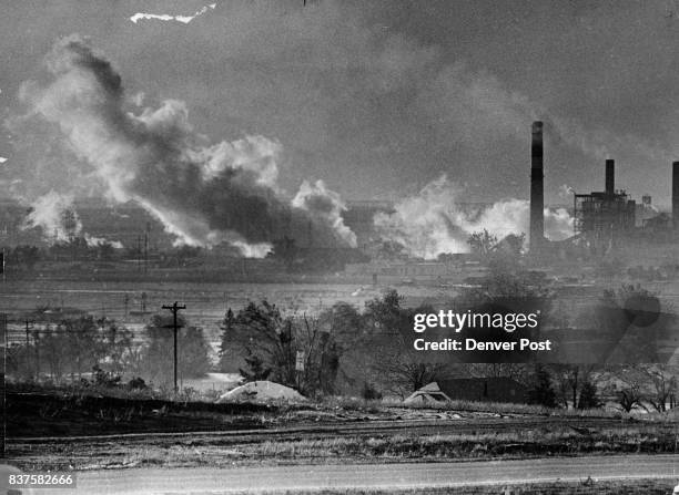 Denver Wraps Itself in a Blanket of Smog-Again The Public Service Co.'s Cherokes St. Power plant in north Denver belches steam and smoke into the...