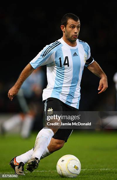 Javier Mascherano of Argentina runs with the ball during the International Friendly match between Scotland and Argentina at Hampden Park on November...