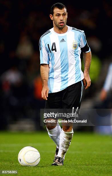 Javier Mascherano of Argentina runs with the ball during the International Friendly match between Scotland and Argentina at Hampden Park on November...