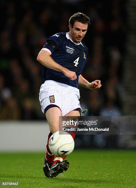 Stephen McManus of Scotland runs with the ball during the International Friendly match between Scotland and Argentina at Hampden Park on November 19,...