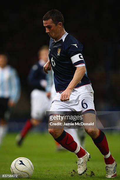 Barry Ferguson of Scotland runs with the ball during the International Friendly match between Scotland and Argentina at Hampden Park on November 19,...