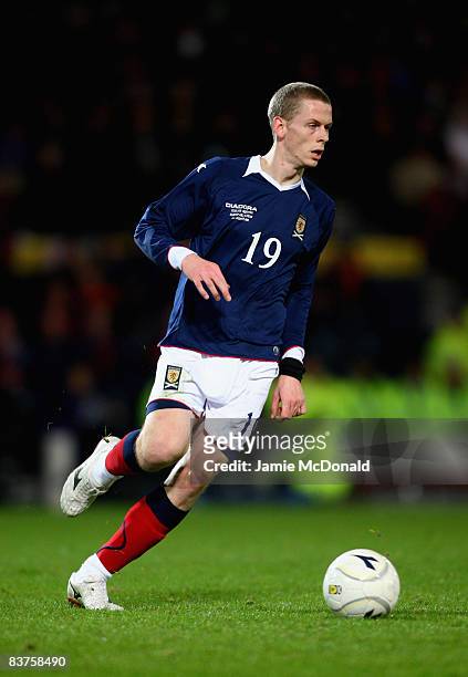 Scott Robertson of Scotland runs with the ball during the International Friendly match between Scotland and Argentina at Hampden Park on November 19,...