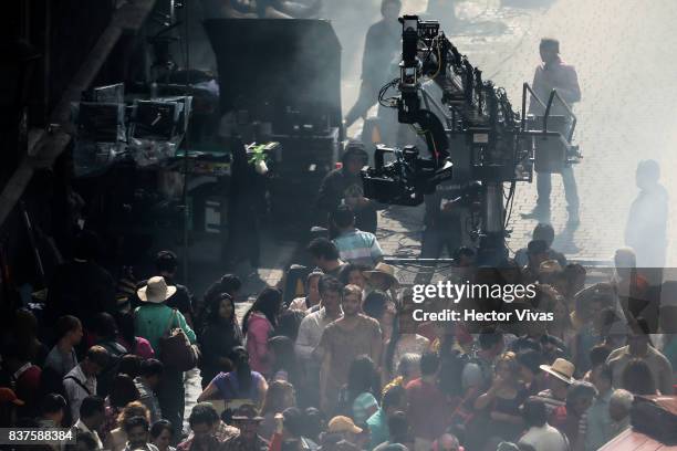 Cast and crew work during the filming of 'Godzilla: King of the Monsters' at Santo Domingo Square on August 22, 2017 in Mexico City, Mexico.