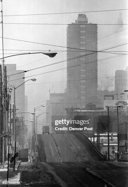 Gray Day For Denver Downtown Denver is nearly obscured by smog Wednesday in this view from 15th and Platte Sts. A temperature inversion has trapped...