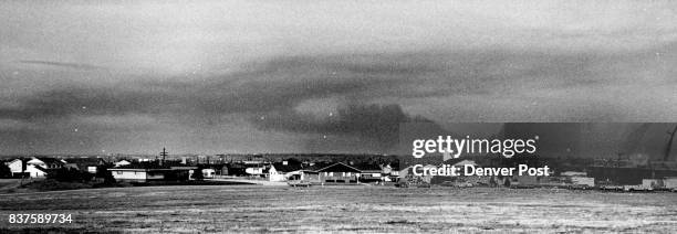 Trees Leave a Pall on Denver's Horizon This view northward from the intersection of the Valley Highway and E. Hampden Ave. Shows the towering cloud...