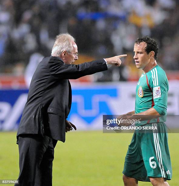 Mexico's coach Sven Goran Ericcson gives instructions to his player Gerardo Torrado during their FIFA World Cup South Africa 2010 qualifying football...