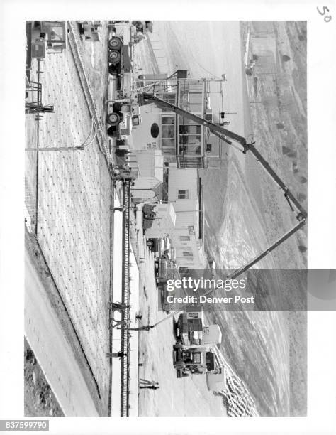 Havengar concrete pour cement on 400 feet of the starting pad at Bandimere speedway. Credit: The Denver Post