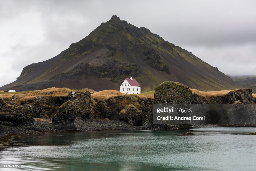 Arnarstapi, Snaefellsnes Peninsula, Western Iceland, Iceland. Lonely house on the coast