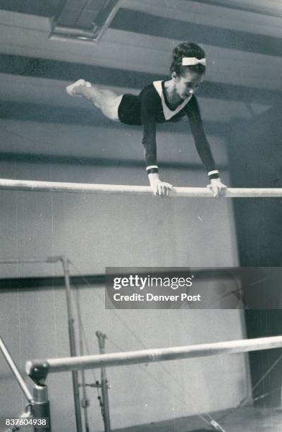 Flying High in the Gymnastics Word Trish, Reed ears "Outstanding Gymnast" award. Credit: Denver Post