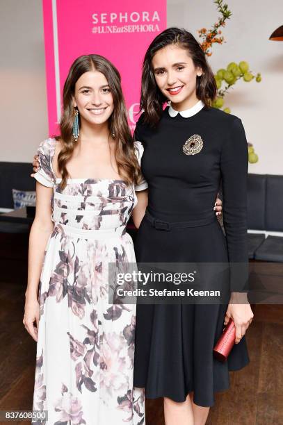 Amanda Alagem and Nina Dobrev attend Nina Dobrev celebrates the harper by Harper's BAZAAR September Issue with an Event Presented By Sephora In LA at...