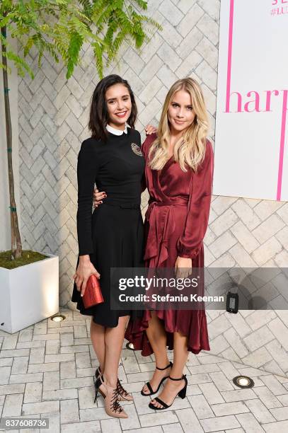 Nina Dobrev and Claire Holt attend Nina Dobrev celebrates the harper by Harper's BAZAAR September Issue with an Event Presented By Sephora In LA at...