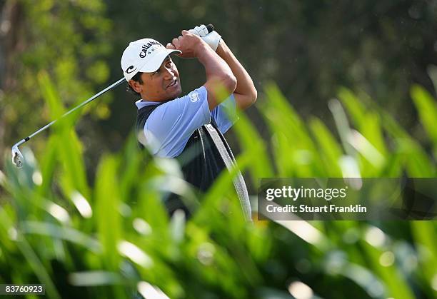 Michael Campbell of New Zealand plays his tee shot on the second during the first round of the UBS Hong Kong Open at the Hong Kong Golf Club on...