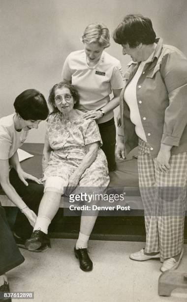 Hannah Pearl Goodman Gets Help In Therapy Room From left, Sharon McHugh and Lynn Hamilton. Nurse Estelle Rador cheers. Credit: Denver Post