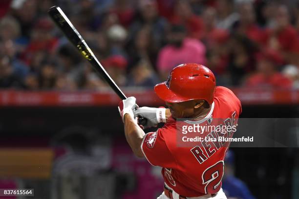 Ben Revere of the Los Angeles Angels of Anaheim hits a single in the second inning against the Texas Rangers at Angel Stadium of Anaheim on August...