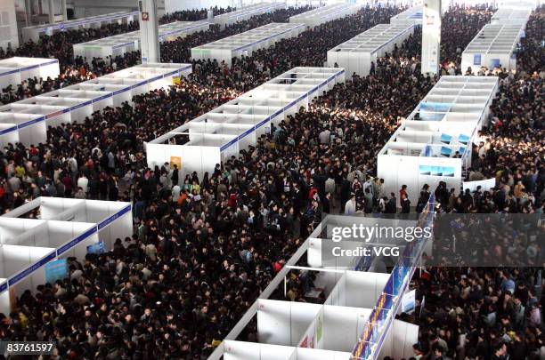 University graduates hunt for jobs at a job fair on November 20, 2008 in Nanjing, east China's Jiangsu province. China's Human Resources and Social...