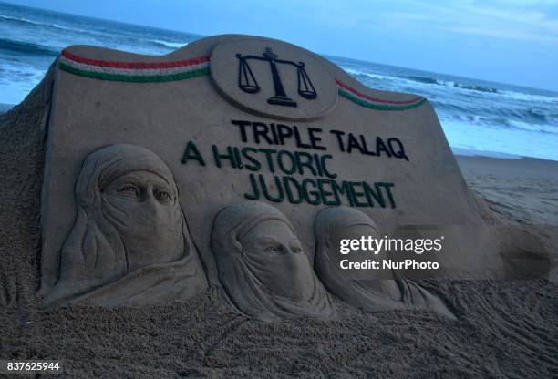 Sand art is seen at the Bay of Bengal, Sea's eastern coast beach as it created by Indian sand artist Sudarshan Patnaik for public awareness about the...