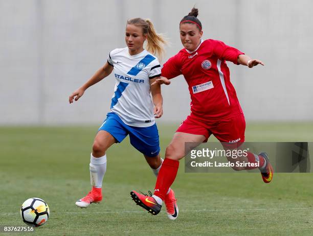 Diana Csanyi of MTK Hungaria FC duels for the ball with Blerina Musa of WFC Hajvalia during the UEFA Women's Champions League Qualifying match...