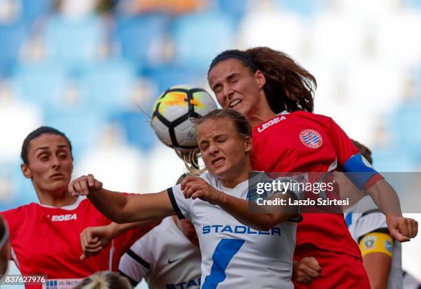 Diana Csanyi of MTK Hungaria FC competes for the ball in the air with Feride Kastrati of WFC Hajvalia and Zelfie Bajramaj of WFC Hajvalia during the...