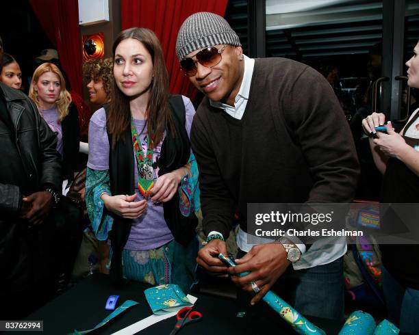 Socialite Fabiola and recording artist LL Cool J attend the sixth annual "Wrap to Rap" hosted by New Yorkers For Children to benefit children in...