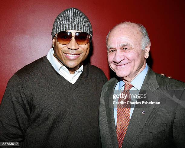 Recording artist LL Cool J and NYC Fire Commissioner Nicholas Scoppetta attend the sixth annual "Wrap to Rap" hosted by New Yorkers For Children to...