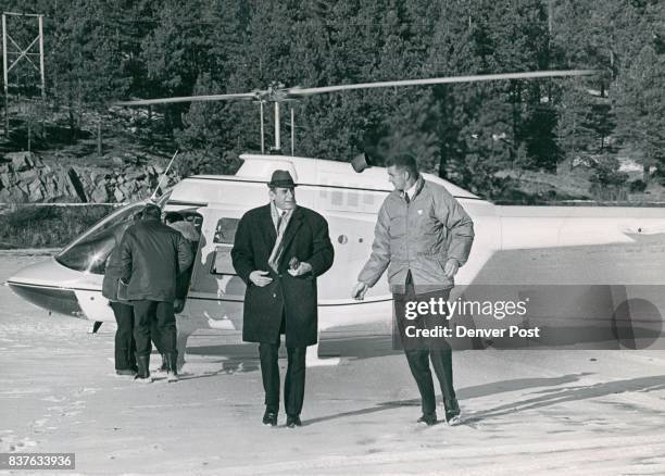 Inspecting for Luge Bert Isatitsch of Rottenmann, Austria, president of the International Luge Fed­eration, joins Gerry Groswold of the Den­ver...